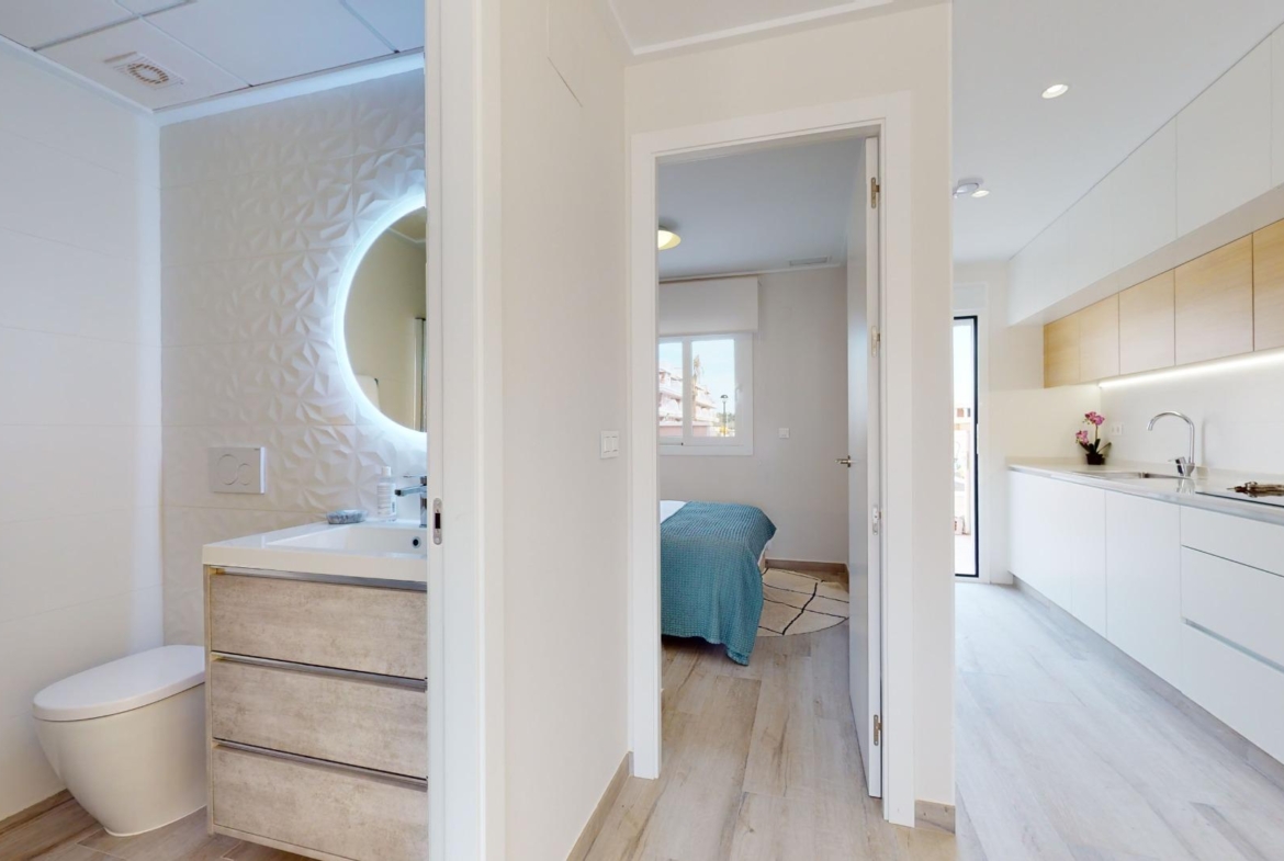 ADOSADOS DE OBRA NUEVA EN PILAR DE LA HORADADA. 3 DORM. 2 BAÑOS. CON PLAZA DE GARAJE Y PISCINA. 83 M2. JARDIN 33 M2. SOLARIUM 34 M2.