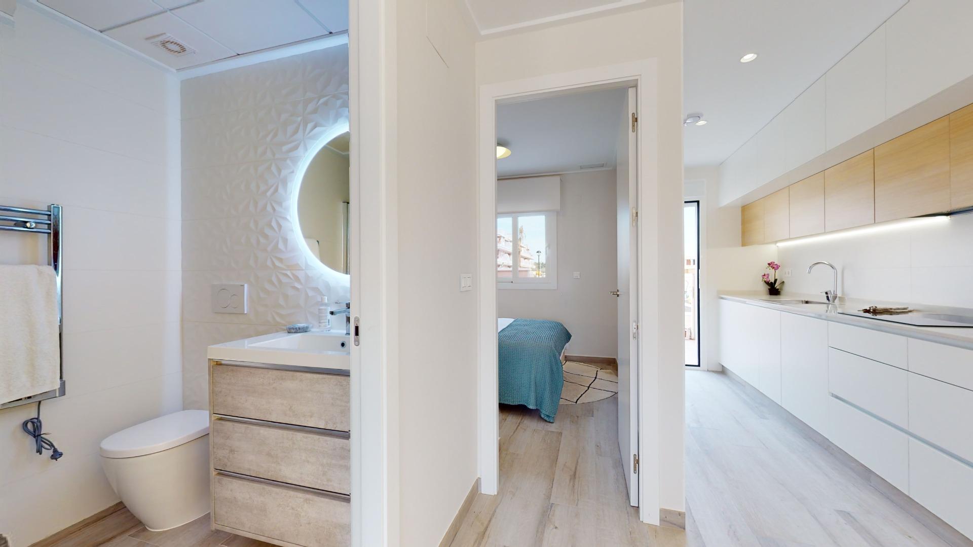 4-87-3 ADOSADOS DE OBRA NUEVA EN PILAR DE LA HORADADA. 3 DORM. 2 BAÑOS. CON PLAZA DE GARAJE Y PISCINA. 83 M2. JARDIN 33 M2. SOLARIUM 34 M2.