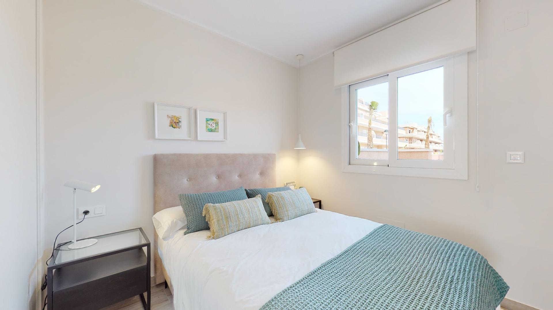 4-88-3 ADOSADOS DE OBRA NUEVA EN PILAR DE LA HORADADA. 3 DORM. 2 BAÑOS. CON PLAZA DE GARAJE Y PISCINA. 83 M2. JARDIN 33 M2. SOLARIUM 34 M2.
