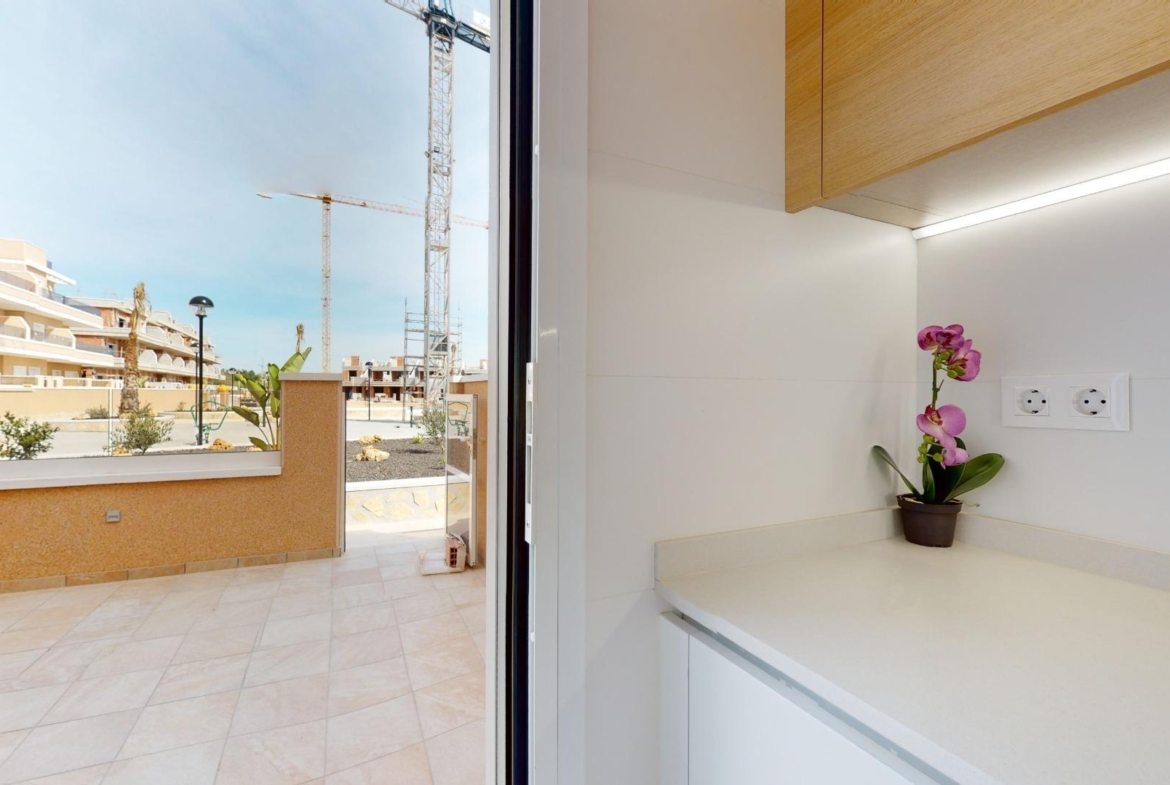 ADOSADOS DE OBRA NUEVA EN PILAR DE LA HORADADA. 3 DORM. 2 BAÑOS. CON PLAZA DE GARAJE Y PISCINA. 83 M2. JARDIN 33 M2. SOLARIUM 34 M2.