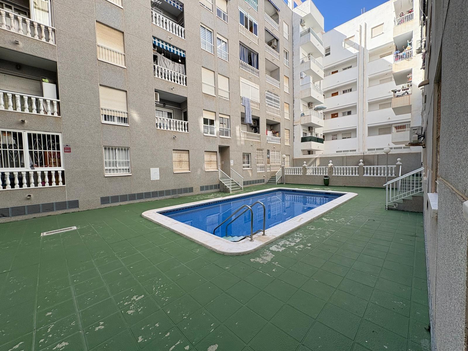 Charming Apartment in the Heart of Torrevieja 🏡✨ 2 Bedrooms 1 Bathroom with Patio and Pool